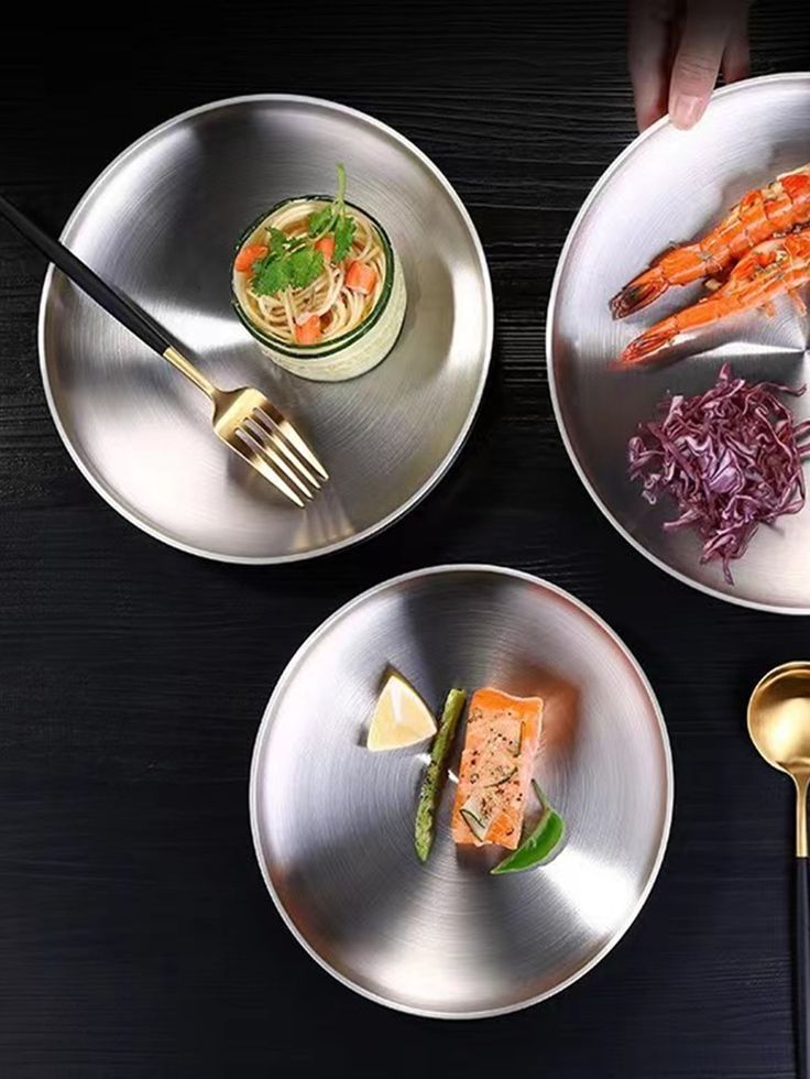 Modern stainless steel serving plates