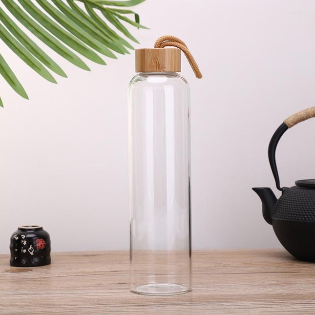 Glass water bottles with natural bamboo lids
