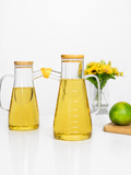 Glass oil dispenser with measurement