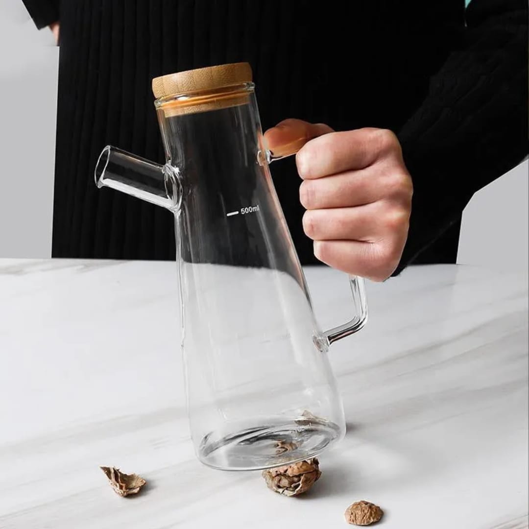 Glass oil dispenser with measurement